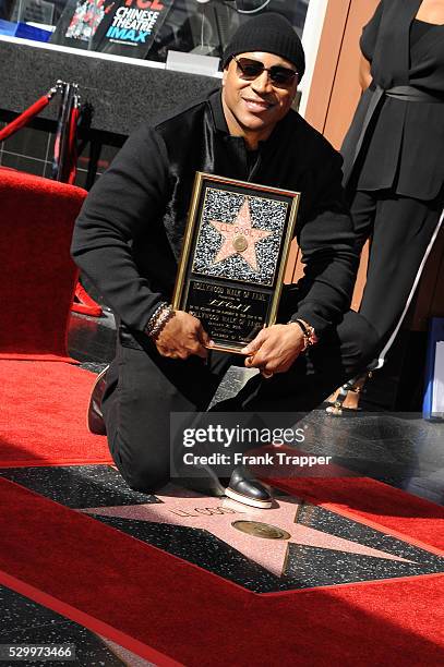 Rapper-actor LL Cool J is honored with a Star on the Hollywood Walk of Fame.