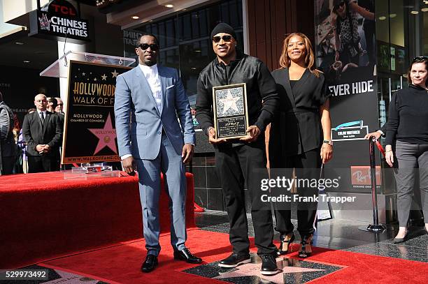 Rapper-actors Sean Combs, LL Cool J and Queen Latifah pose at the ceremony that honored LL Cool J with a Star on the Hollywood Walk of Fame.