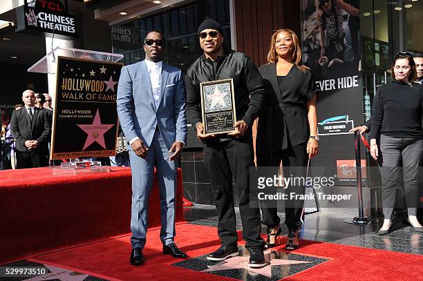 Rapper-actors Sean Combs, LL Cool J and Queen Latifah pose at the ceremony that honored LL Cool J with a Star on the Hollywood Walk of Fame.