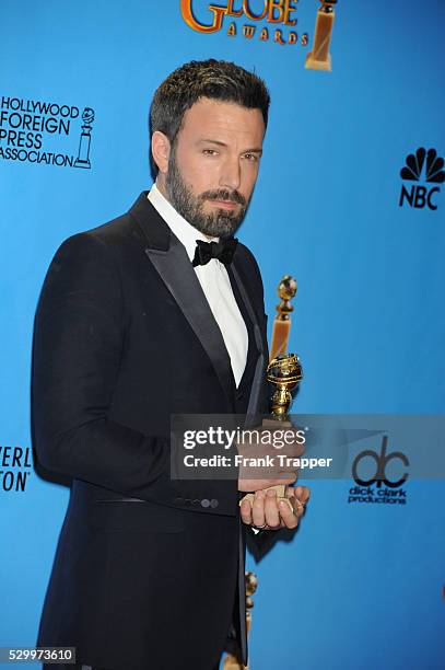Director Ben Affleck, winner Best Director - Motion Picture for Argo', posing at the 70th Annual Golden Globe Awards held at The Beverly Hilton Hotel.