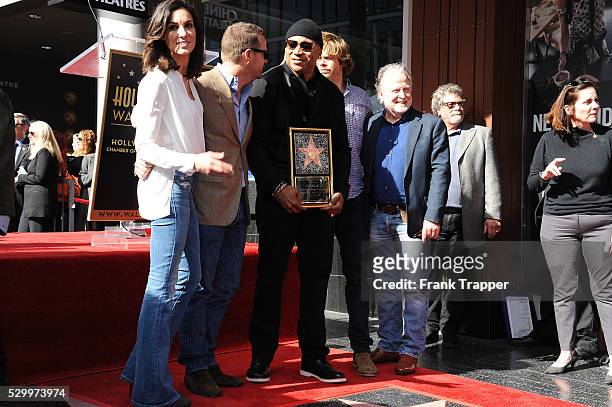 Actors Daniela Ruah, Chris O'Donnell, LL Cool J, Eric Christian Olsen and producer Shane Brennan pose at the ceremony that honored LL Cool J with a...