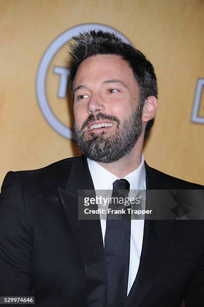 Actor-director Ben Affleck, winner of Outstanding Performance by a Cast in a Motion Picture for Argo, posing at the 19th Annual Screen Actors Guild...