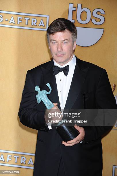 Actor Alec Baldwin, winner of Outstanding Performance by a Male Actor in a Comedy Series for 30 Rock, posing at the 19th Annual Screen Actors Guild...