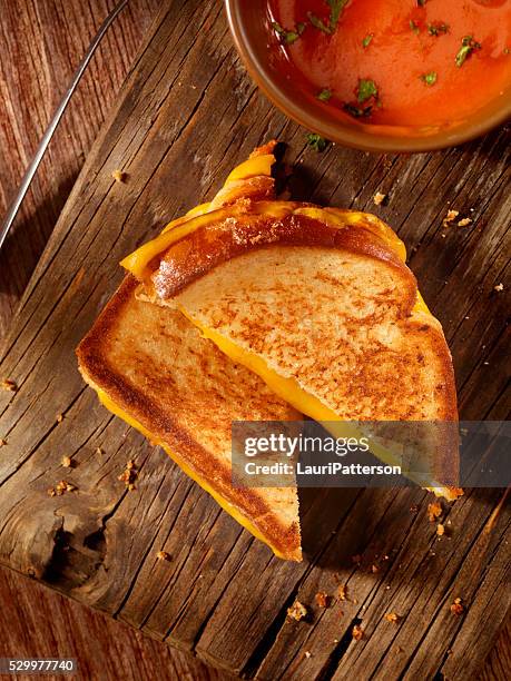 grilled cheddar cheese sandwich with tomato soup - soup and sandwich stock pictures, royalty-free photos & images