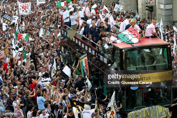 The bus with the Juventus Team is seen during their tour around the town to celebrate their victory of "scudetto" at the end of the last Serie A...
