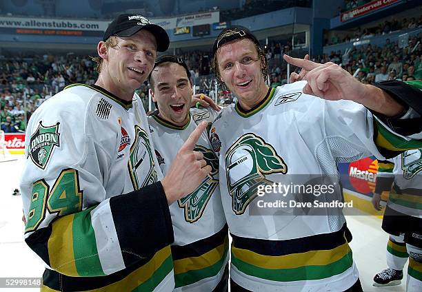 Corey Perry, Dylan Hunter and Marc Methot of the London Knights celebrate their 4-0 victory over the Rimouski Oceanic in the Memorial Cup Tournament...