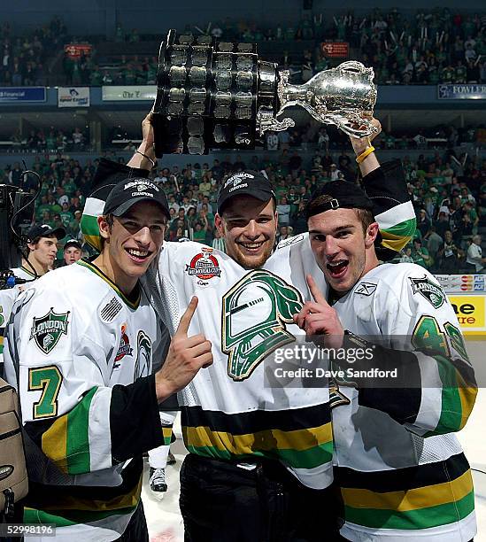 Drew Larman, Robbie Schremp, and Danny Fritsche of the London Knights celebrate their 4-0 victory over the Rimouski Oceanic in the Memorial Cup...