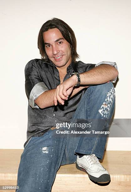 Latin musician Hector Montaner poses backstage at the Juan Luis Guerra concert at the Miami Arena on May 29, 2005 in Miami, Florida.