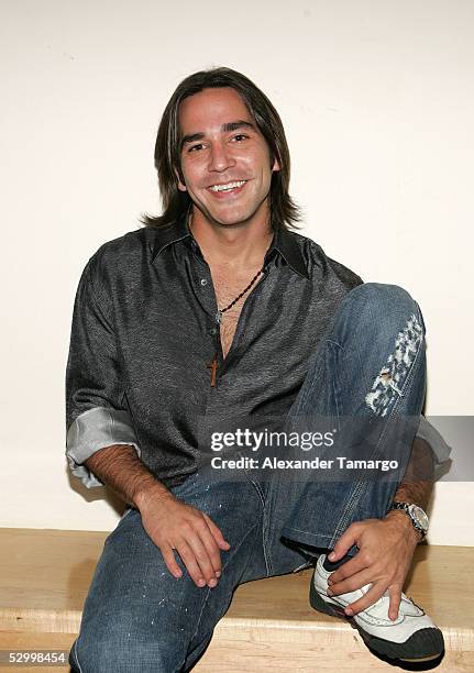 Latin musician Hector Montaner poses backstage at the Juan Luis Guerra concert at the Miami Arena on May 29, 2005 in Miami, Florida.