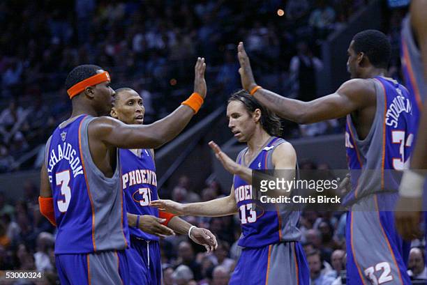 Quentin Richardson, Shawn Marion, Steve Nash and Amare Stoudemire of the Phoenix Suns celebrate a victory against the San Antonio Spurs in Game four...