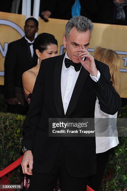 Actor Daniel Day Lewis arrives at the 19th Annual Screen Actors Guild Awards held at The Shrine Auditorium .