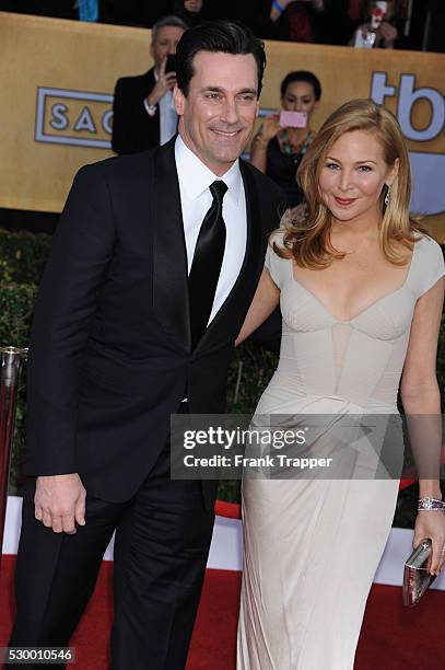 Actor Jon Hamm and guest Jennifer Westfeldt arrive at the 19th Annual Screen Actors Guild Awards held at The Shrine Auditorium .