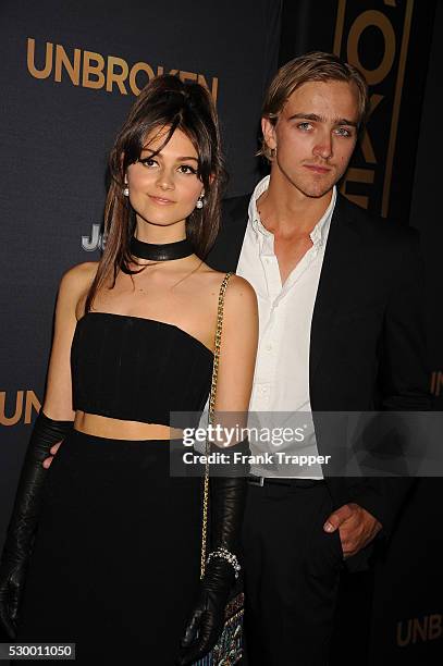 Actress Sophie Dalah and guest arrive at the premiere of "Unbroken" held at The Dolby Theater in Hollywood.