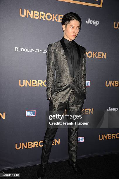 Actor and composer Takamasa Ishihara arrives at the premiere of "Unbroken" held at The Dolby Theater in Hollywood.