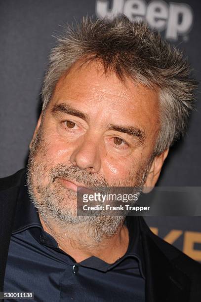 Director Luc Besson arrives at the premiere of "Unbroken" held at The Dolby Theater in Hollywood.