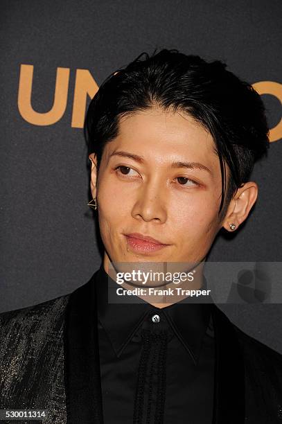Actor and composer Takamasa Ishihara arrives at the premiere of "Unbroken" held at The Dolby Theater in Hollywood.