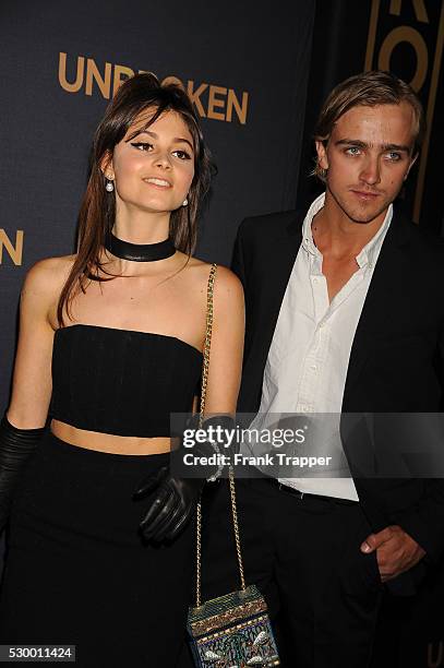 Actress Sophie Dalah and guest arrive at the premiere of "Unbroken" held at The Dolby Theater in Hollywood.