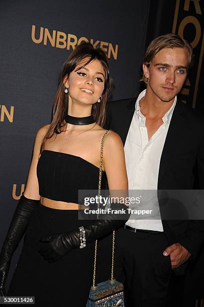 Actress Sophie Dalah and guest arrive at the premiere of "Unbroken" held at The Dolby Theater in Hollywood.