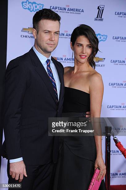 Actress Cobie Smulders and guest arrive at the world premiere of "Captain America: The Winter Soldier" held at the El Capitan Theatre in Hollywood.