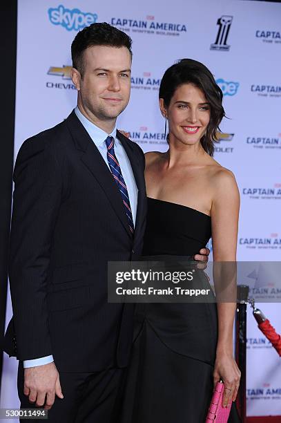 Actress Cobie Smulders and guest arrive at the world premiere of "Captain America: The Winter Soldier" held at the El Capitan Theatre in Hollywood.