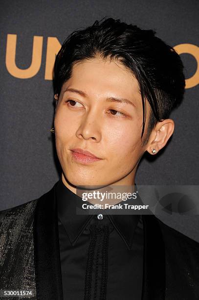 Actor and composer Takamasa Ishihara arrives at the premiere of "Unbroken" held at The Dolby Theater in Hollywood.