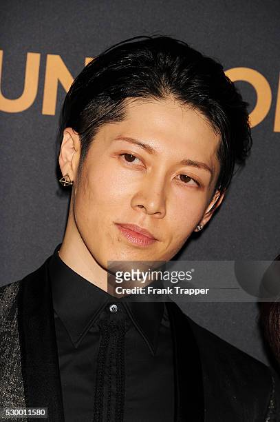 Actor and composer Takamasa Ishihara arrives at the premiere of "Unbroken" held at The Dolby Theater in Hollywood.