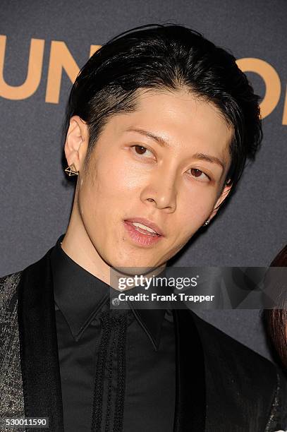 Actor and composer Takamasa Ishihara arrives at the premiere of "Unbroken" held at The Dolby Theater in Hollywood.