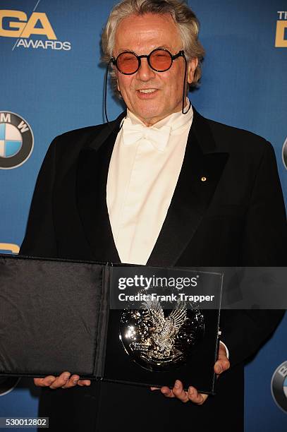 Director George Miller, recipient of the Feature Film Nomination Plaque for ?"Mad Max: Fury Road" posing at the 68th Annual Directors Guild Of...