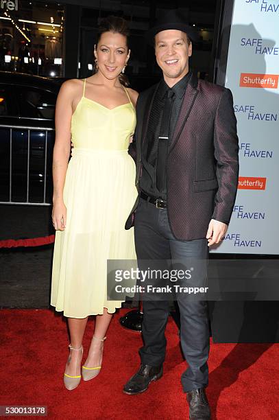 Musicians Colbie Caillat and Gavin DeGraw arrive at the premiere of Safe Haven held at Grauman's Chinese Theater.