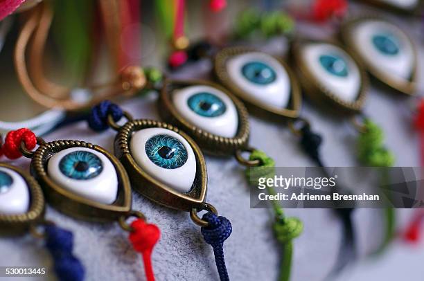 evil eye bracelets for good luck - occhio di vetro foto e immagini stock
