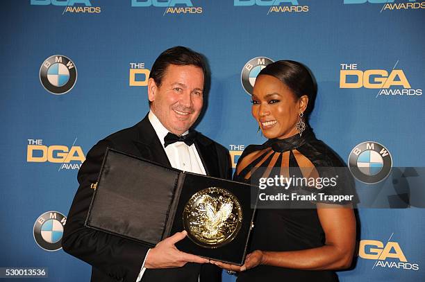 Director David Nutter, winner of the award for Outstanding Directorial Achievement in Dramatic Series for "Game of Thrones" , posing with...