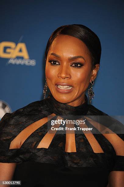 Actress Angela Bassett posing at the 68th Annual Directors Guild Of America Awards held at the Hyatt Regency Century Plaza Hotel in Century City.