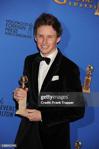 Actor Eddie Redmayne, winner of Best Performance in a Motion Picture - Drama for "The Theory of Everything" posing at the 72nd Annual Golden Globe...