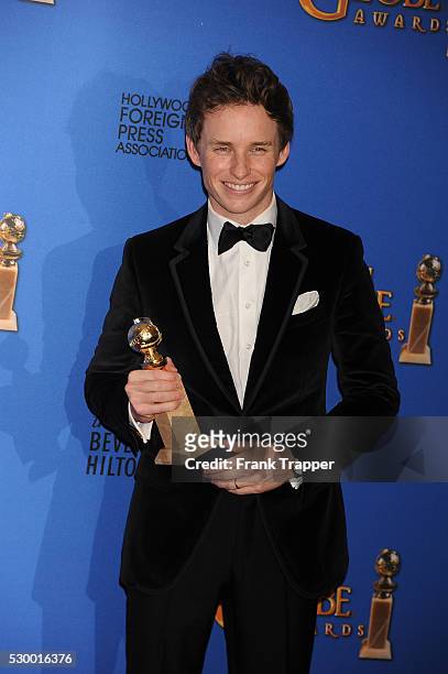 Actor Eddie Redmayne, winner of Best Performance in a Motion Picture - Drama for "The Theory of Everything" posing at the 72nd Annual Golden Globe...
