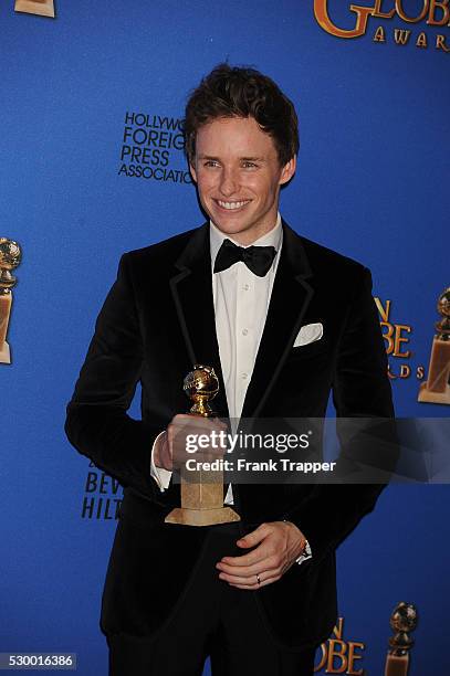 Actor Eddie Redmayne, winner of Best Performance in a Motion Picture - Drama for "The Theory of Everything" posing at the 72nd Annual Golden Globe...