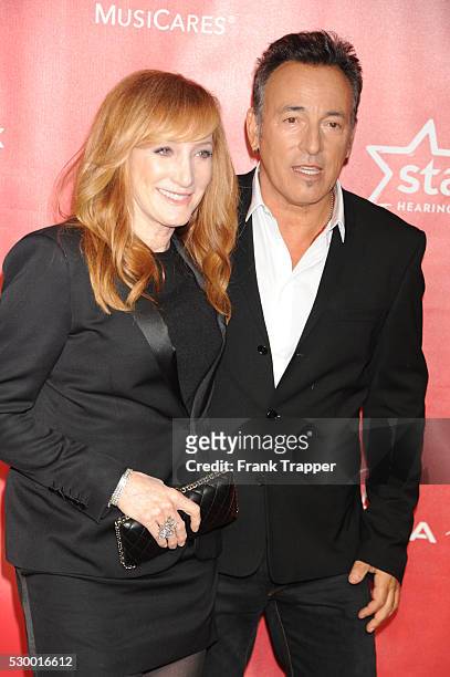 Singer Bruce Springsteen and Patti Scialfa arrive at the 2013 MusiCares Person Of The Year Gala Honoring Bruce Springsteen held at the Los Angeles...