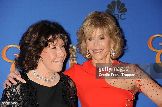 Actors Lily Tomlin and Jane Fonda pose in the press room at the 72nd Annual Golden Globe Awards held at the Beverly Hilton Hotel.