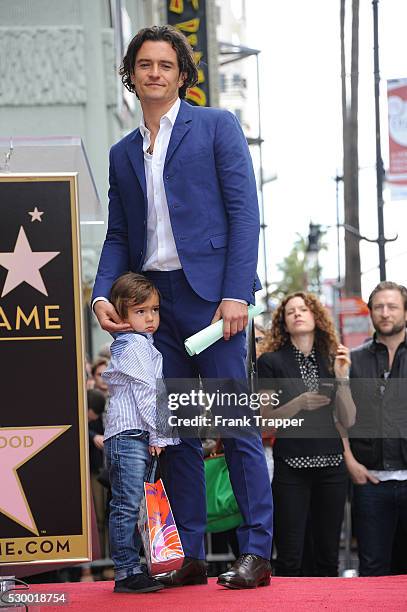 Actor Orlando Bloom pose with his son Flynn at the ceremony that honored him with a Star on the Hollywood Walk of Fame.