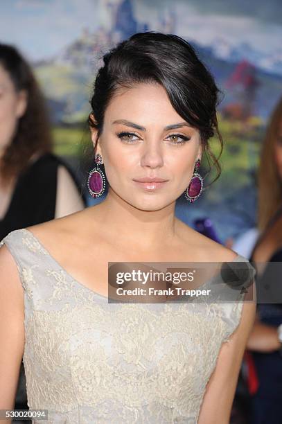 Actress Mila Kunis arrives at the premiere of Oz: The Great and Powerful held at the El Capitan Theater in Hollywood.