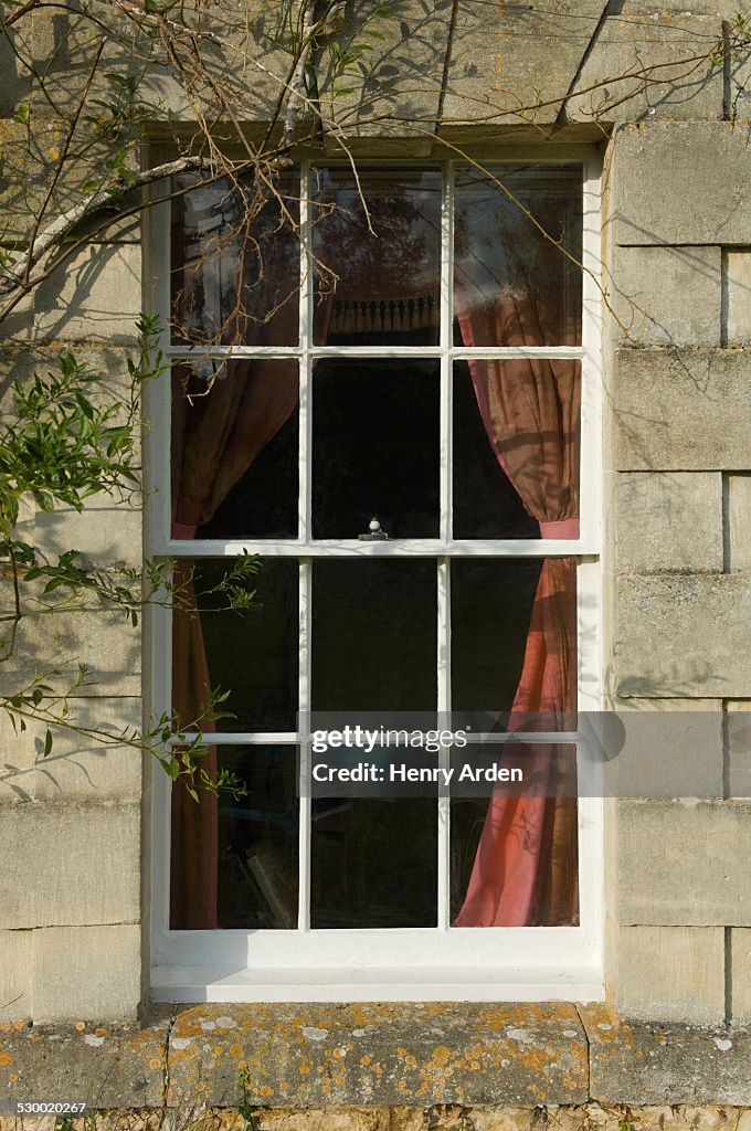 Downstairs window of traditional stone house