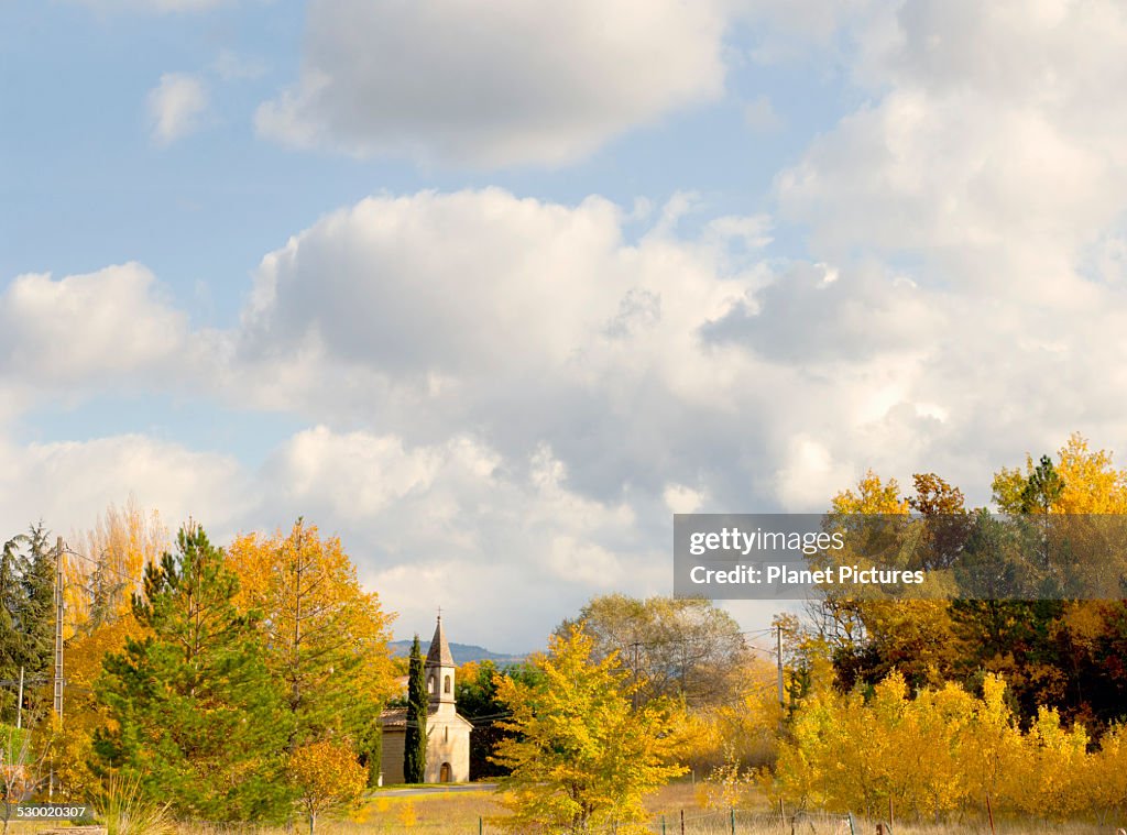 Church and autumn trees, Bedouin, Provence, France