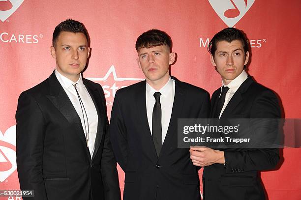 Musicians Matt Helders, Jamie Cook and Alex Turner of Arctic Monkeys arrive at The 2015 MusiCares Person Of The Year honoring Bob Dylan held at the...