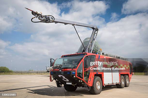 specialist airport fire engine at training facility - firefighter uk stock pictures, royalty-free photos & images