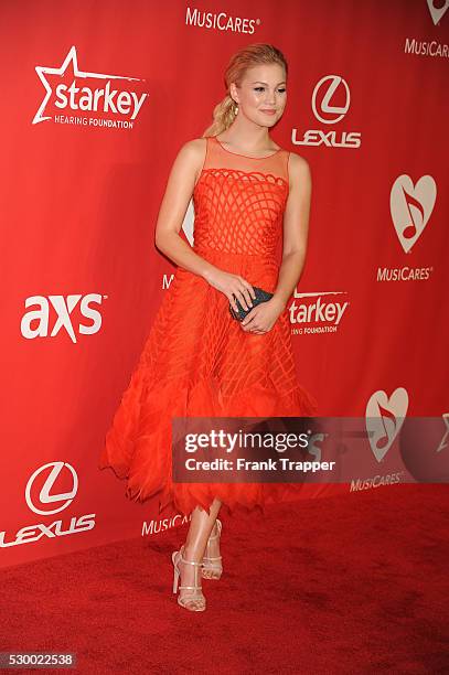 Actress Olivia Holt arrives at The 2015 MusiCares Person Of The Year honoring Bob Dylan held at the Los Angeles Convention Center.