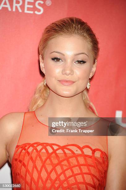 Actress Olivia Holt arrives at The 2015 MusiCares Person Of The Year honoring Bob Dylan held at the Los Angeles Convention Center.