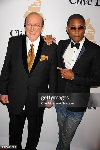 Clive Davis and recording artist Pharrell Williams arrive at the Gala and Salute To Industry Icons honoring Martin Bandier at The Beverly Hilton...