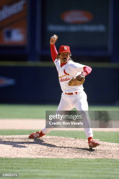 Dennis Eckersley of the St. Louis Cardinals delivers a pitch during a game circa 1996-1997 at Busch Stadium in St. Louis, Missouri.