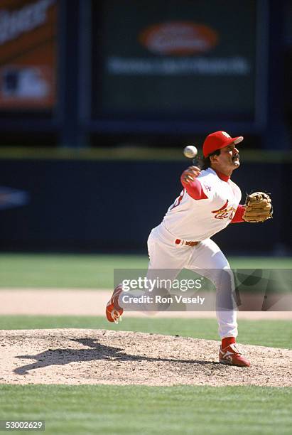 Dennis Eckersley of the St. Louis Cardinals delivers a pitch during a game circa 1996-1997 at Busch Stadium in St. Louis, Missouri.