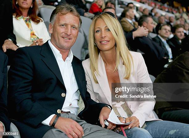 Andreas Brehme and his wife Pilar are seen during the opening game of the Allianz Arena between Bayern Munich and German Football National Team at...
