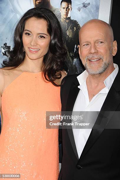 Actor Bruce Willis and Emma Heming arrives at the premiere of G.I. Joe: Retaliation held at the Chinese Theater in Hollywood.